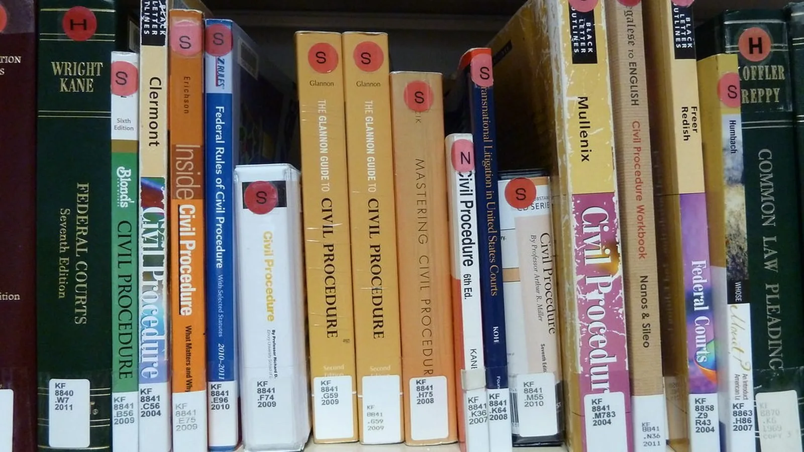 Rows of book spines on a library shelf